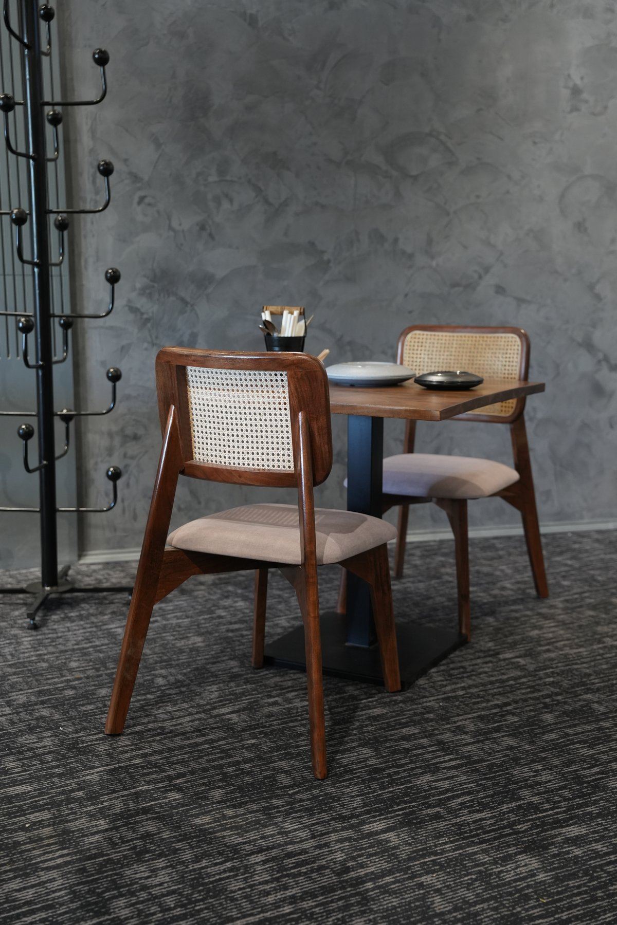 EBD Café intimate corner seating with artisan wall texture
